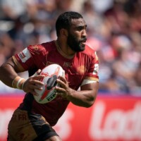 Photo Terry Donnelly - Rugby player runs at high speed holding the ball